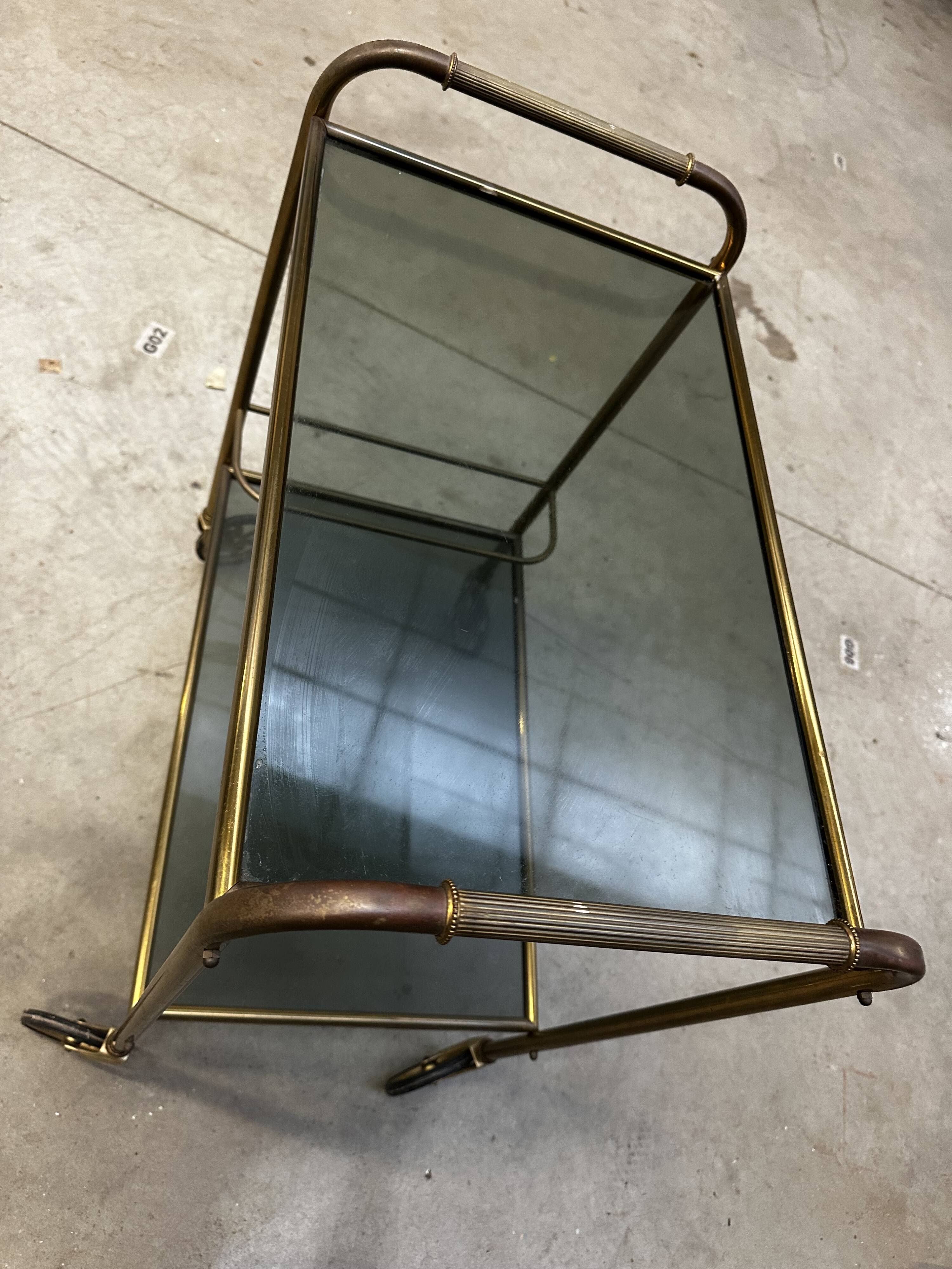 Vintage 70s serving trolley in gold metal and smoked glass
