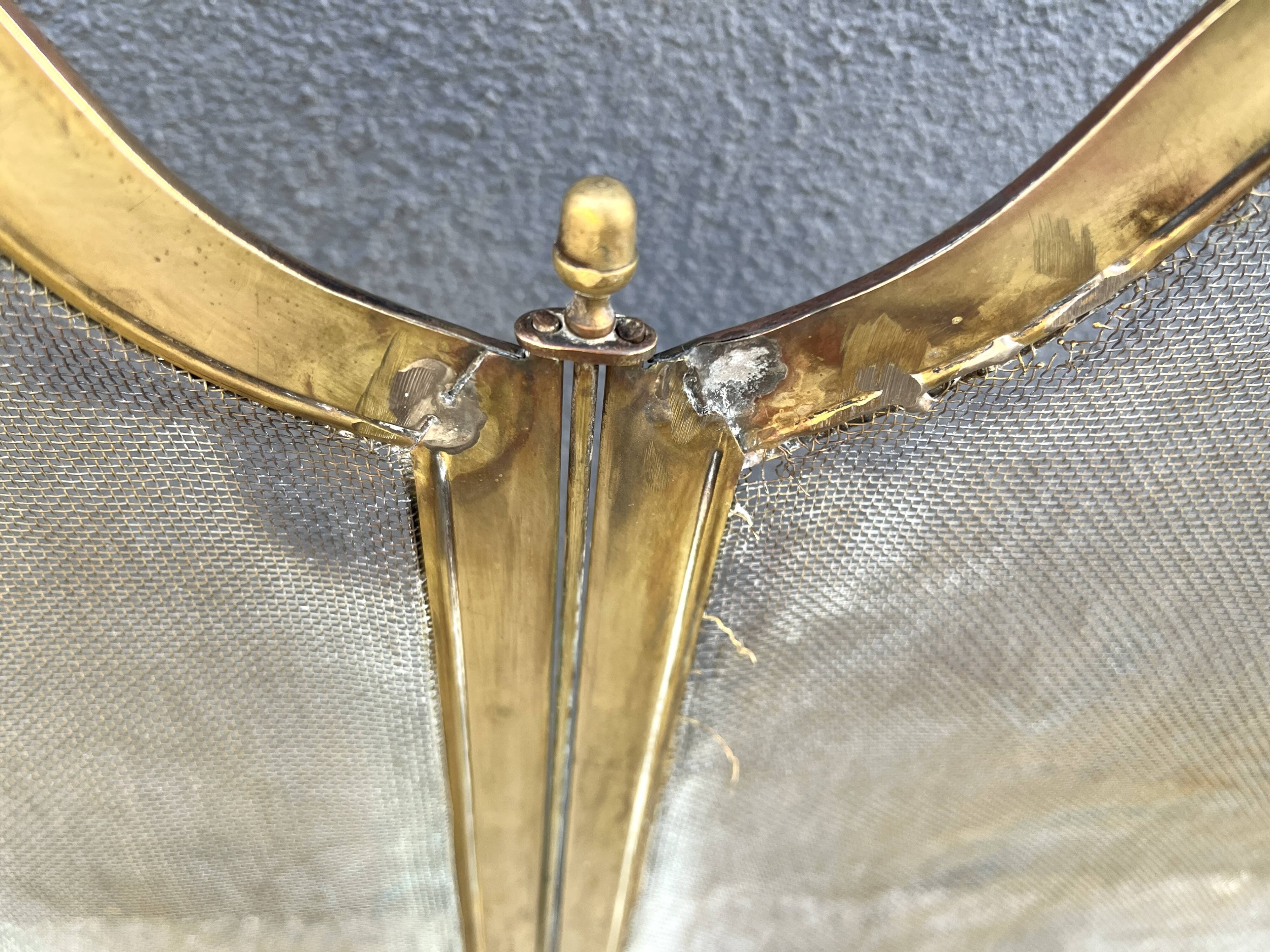 19th-century fireplace screen by Bouhon Frères in brass