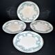 Onnaing Faïencerie set of 4 Coppelia plates with green floral decoration, iron earthenware