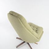 Green swivel Scandinavian armchair