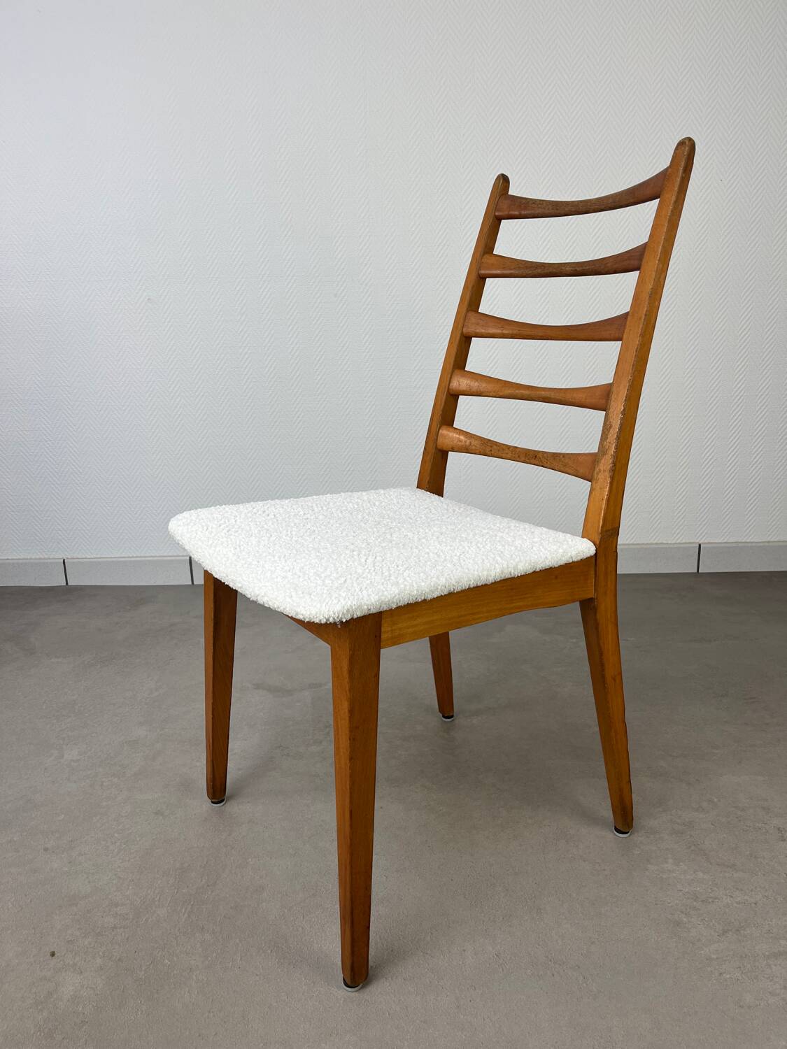 4 Scandinavian chairs, teak with boucle seats.