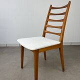 4 Scandinavian chairs, teak with boucle seats.