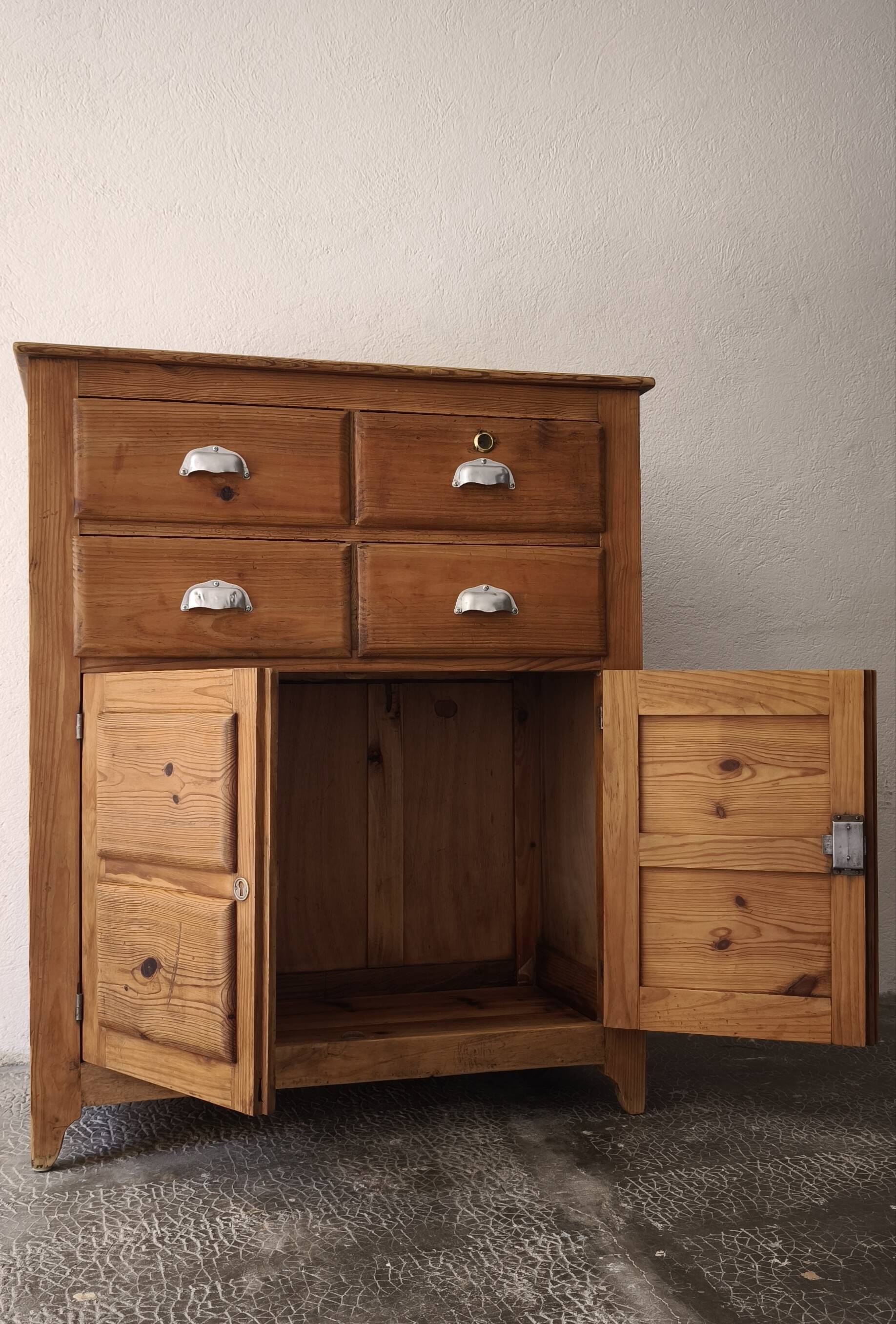 Small antique workshop furniture made of solid wood.