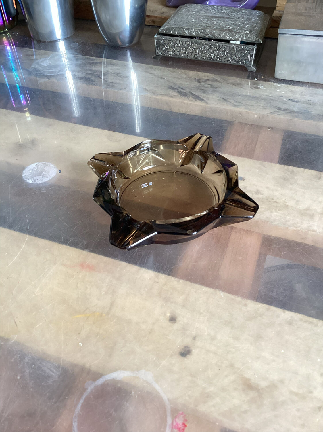 Empty ashtray vintage smoked glass pocket