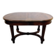 Oval wooden table with extensions