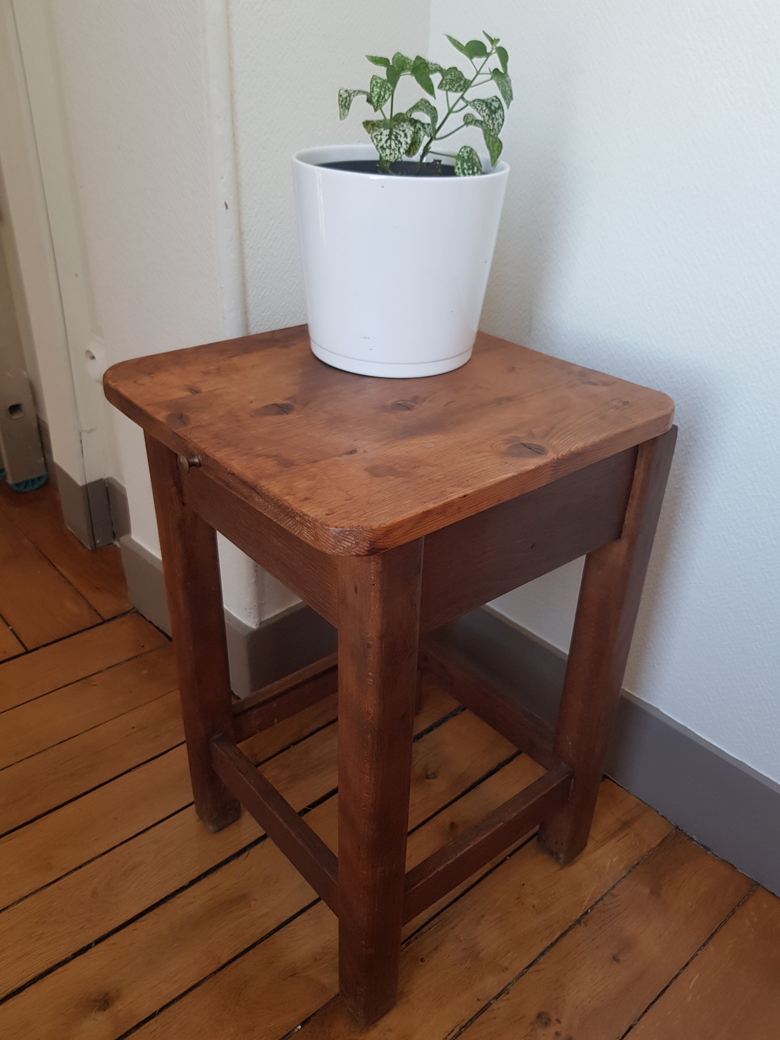 Wooden stool with chest