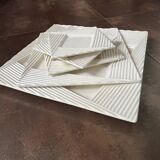 5 nesting plates by Paco Rabanne in Gien earthenware.