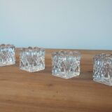 4 bougeoirs en verre ciselé