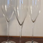 3 large crystal champagne flutes. No brand.