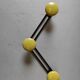 Vintage wall mount in black and yellow metal