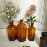 Trio of apothecary bottles