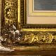 Framed antique engraving under glass