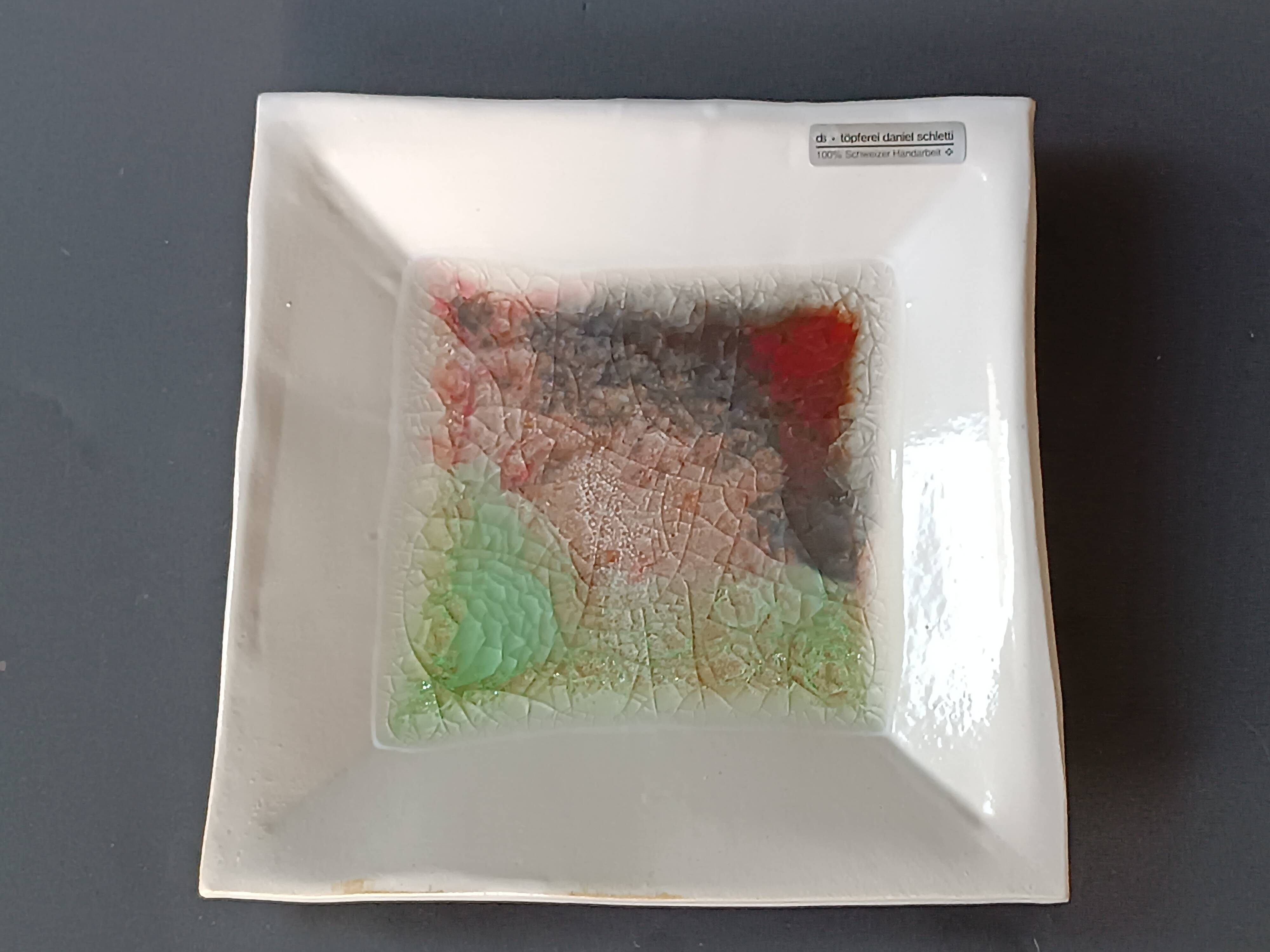 White ceramic and green crystal glass catch-all by Daniel Schletti.