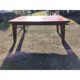 1960s oak dining table with integrated extensions.
