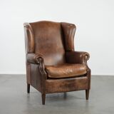 Warm, cosy and comfortable vintage sheepskin ear armchair with character