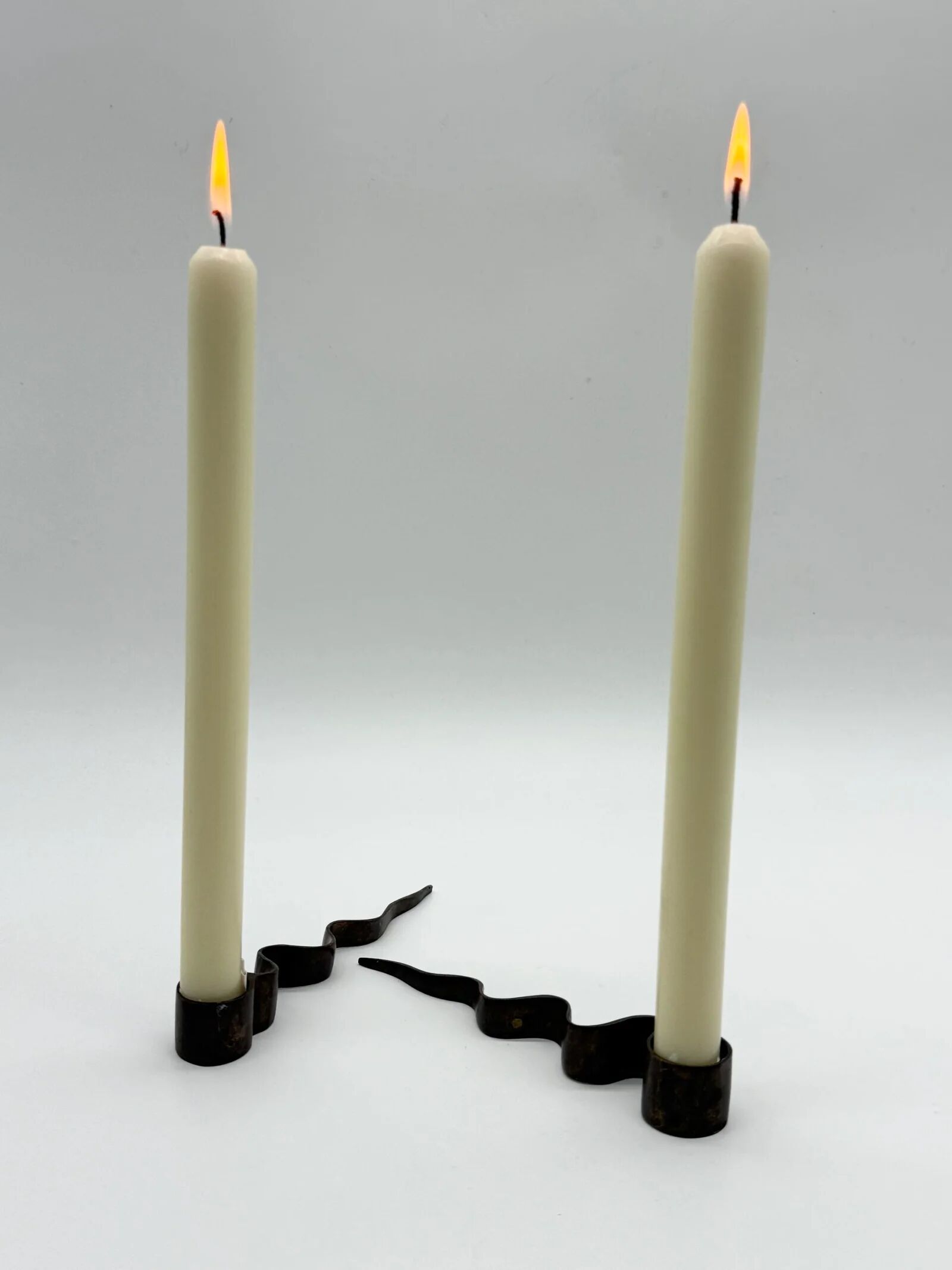 Pair of "Serpentine" candlesticks, modernist, 1970s