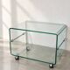 Glass coffee table on wheels