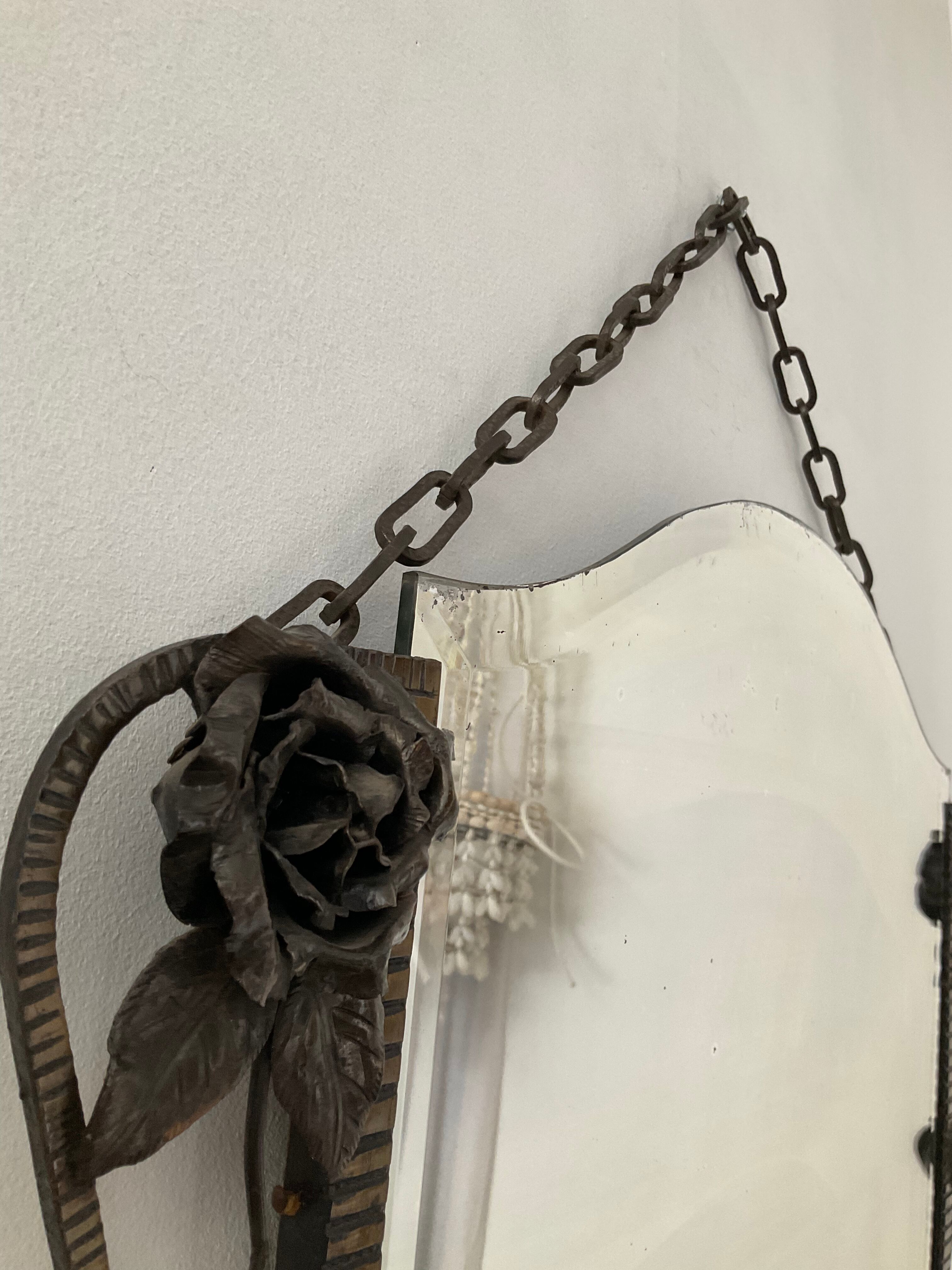Beveled Art Deco wrought iron mirror