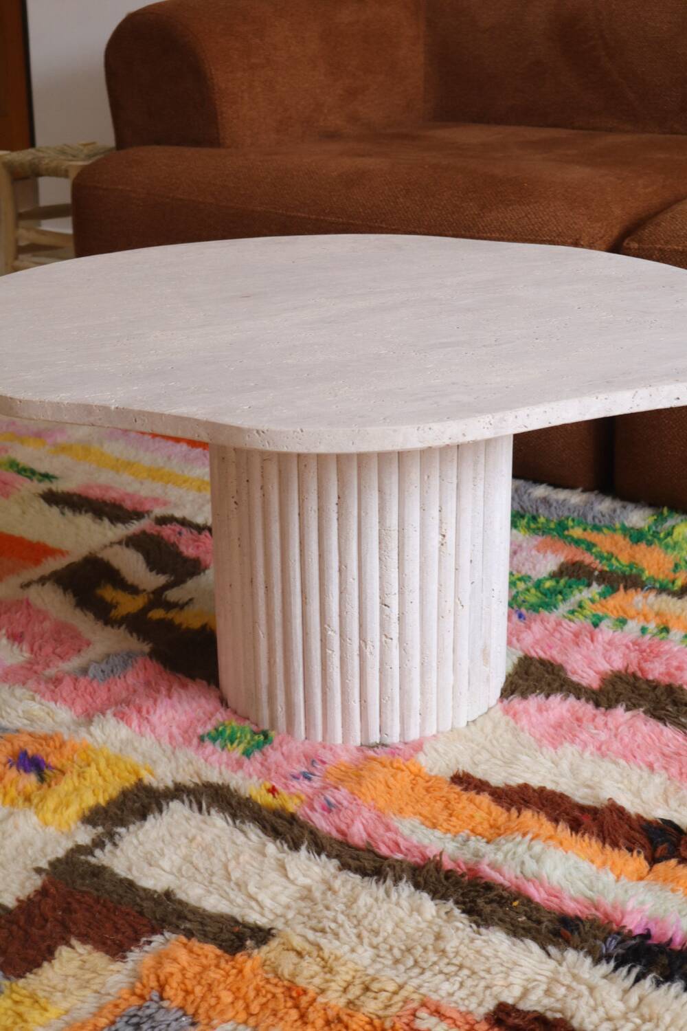 Organic shape travertine coffee table