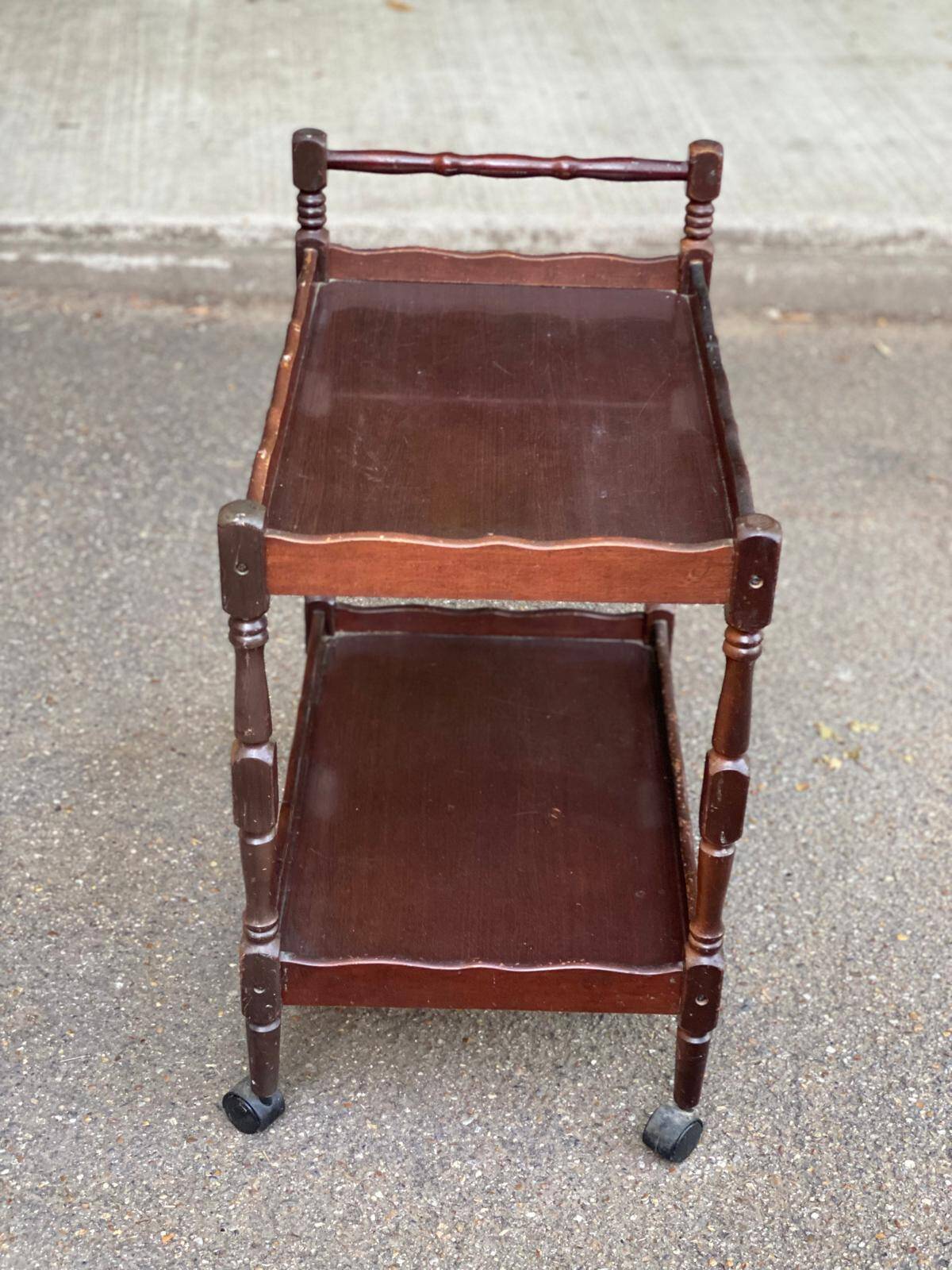 Solid wood serving trolley on wheels