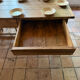 Renovated raw wood farmhouse table
