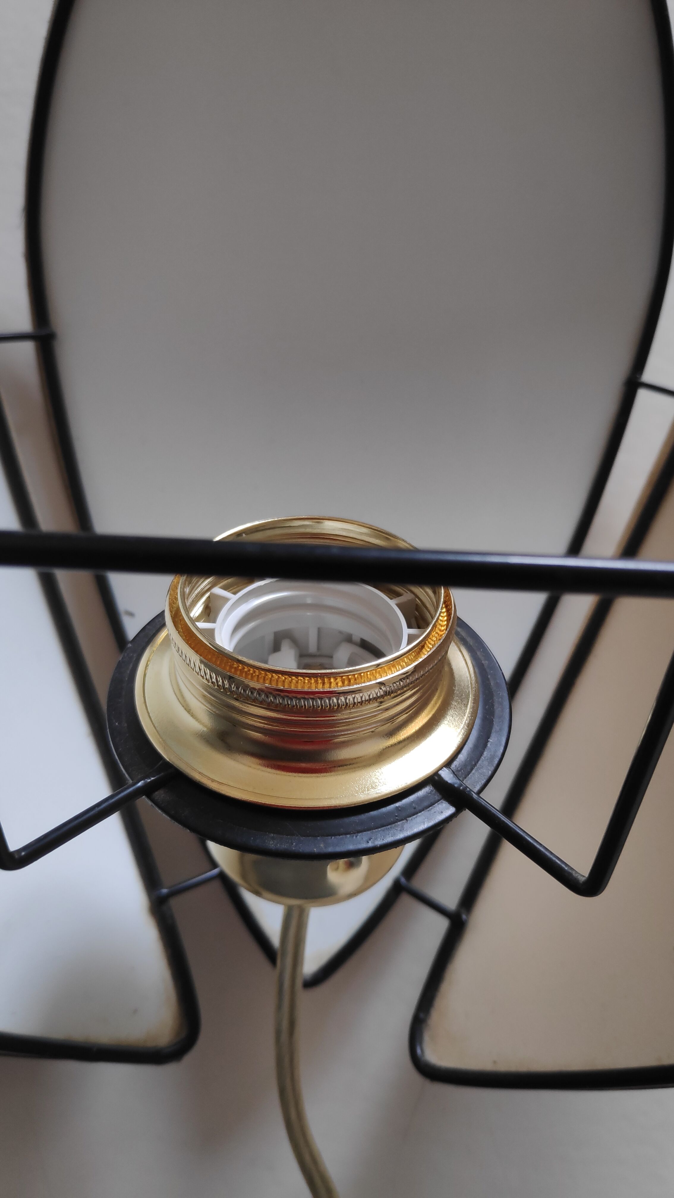 Black and gold wall lamps