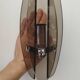 Two vintage smoked glass wall lights