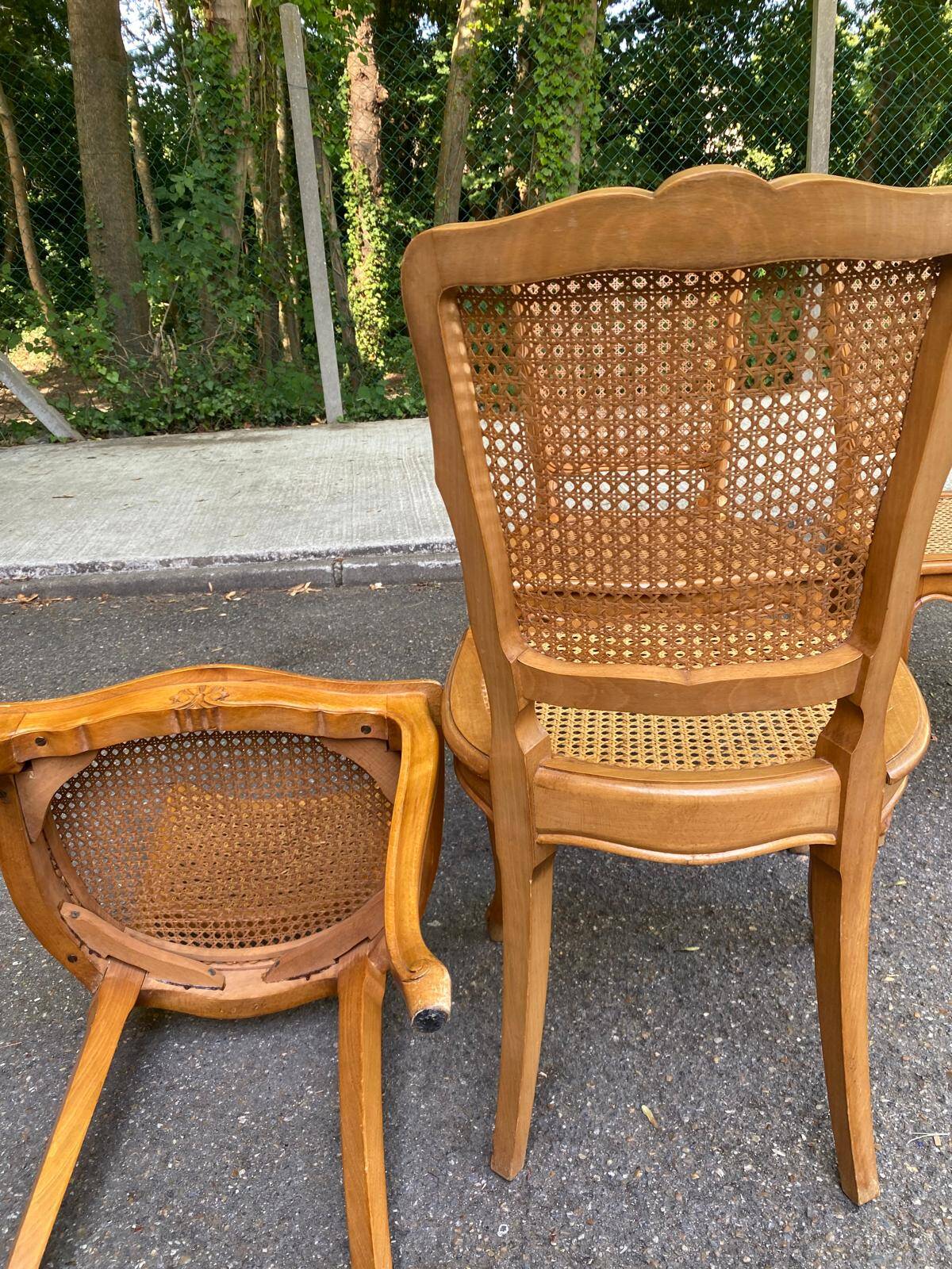 4 Louis XV dining chairs in light solid wood with caning.