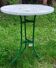 Old metal and wood pedestal table
