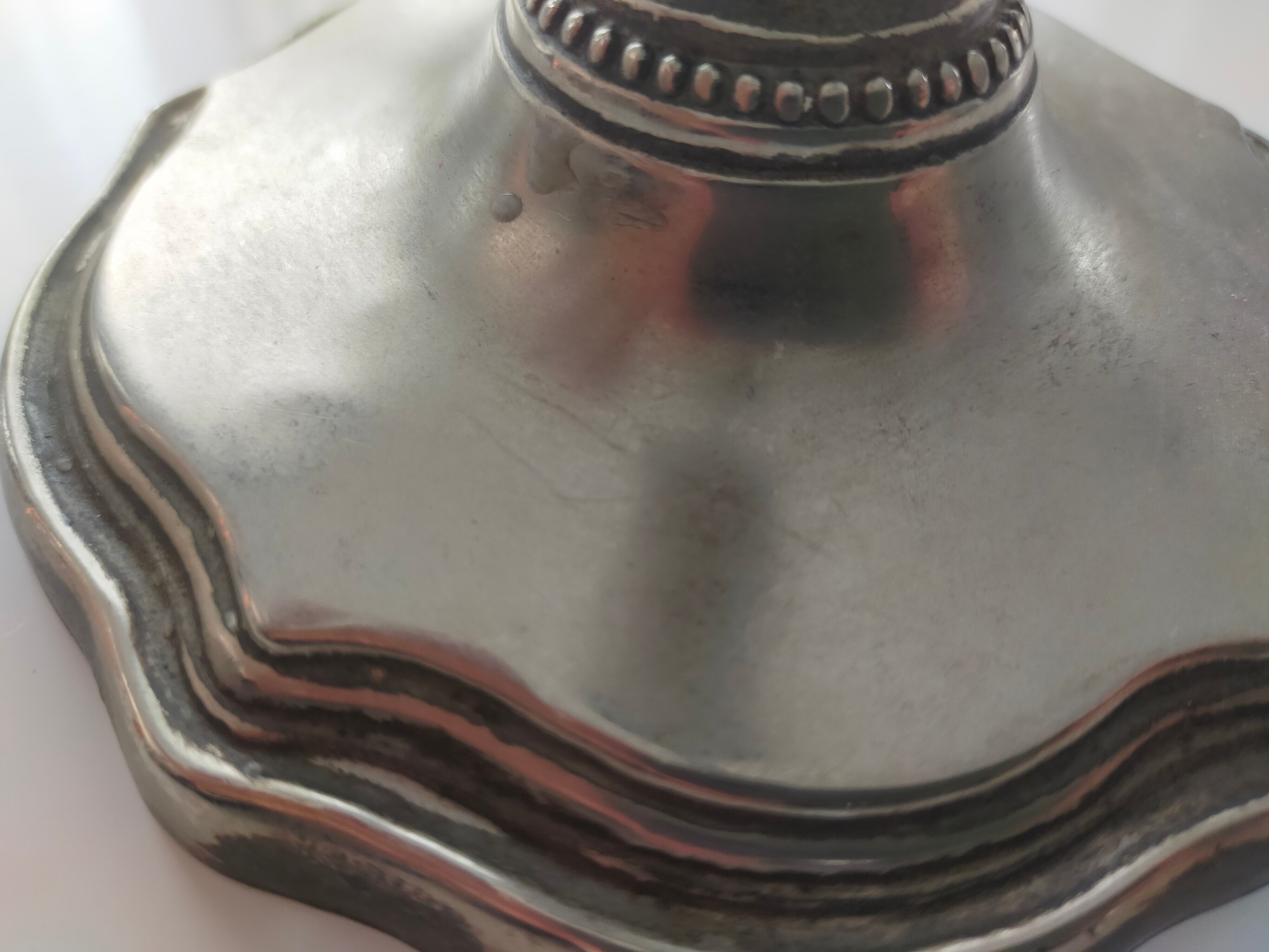 Pair of silver metal candlesticks