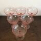 Champagne glass in pink glass with floral engraving