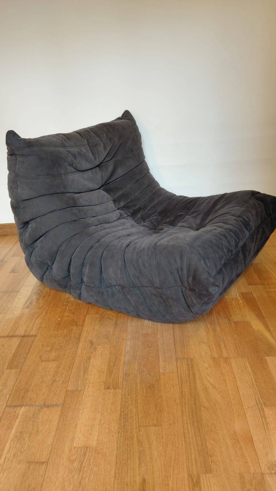 Togo armchair by Ligne Roset in anthracite alcantara.