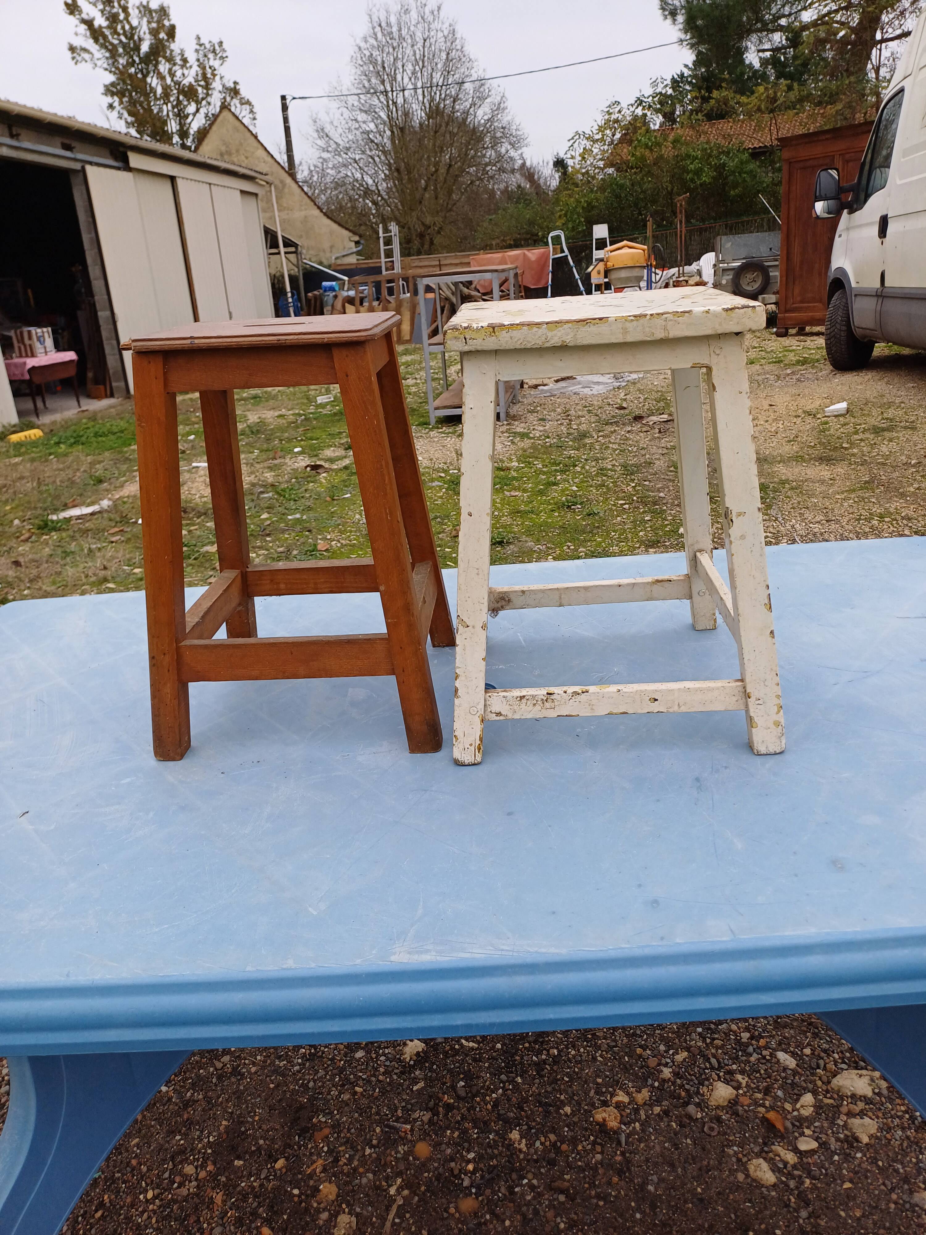 2 wooden workshop stools