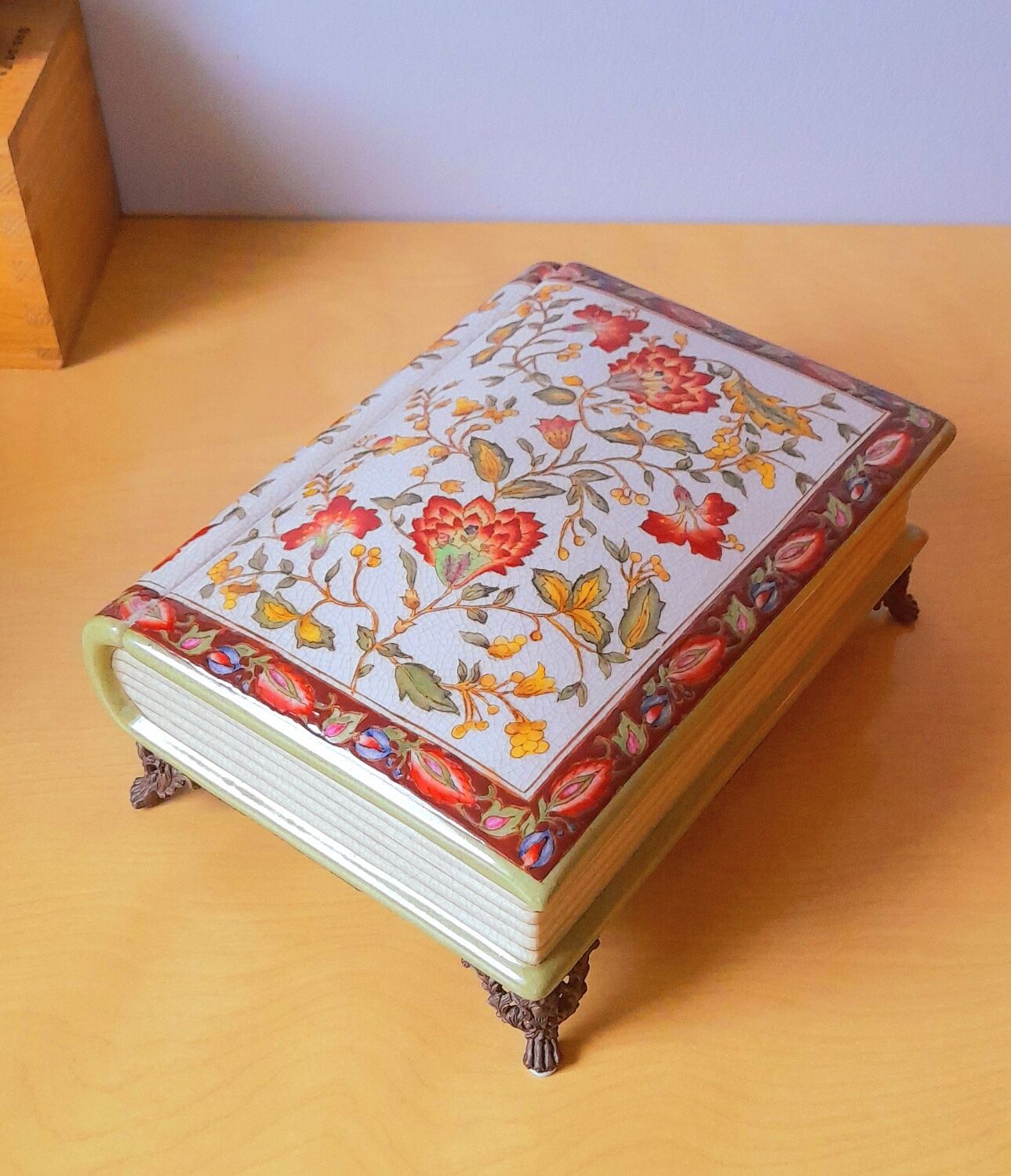 Porcelain box on claw feet