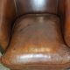 Set of two rugged sheep let of two rugged sheep leather club armchairs with a nice distressed look