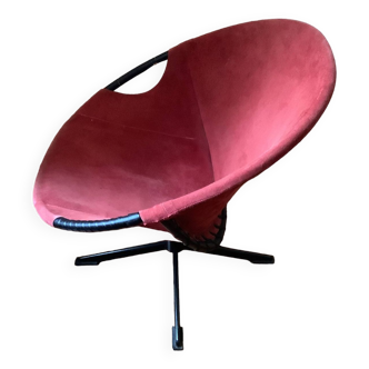 Lush red swivel balloon chair