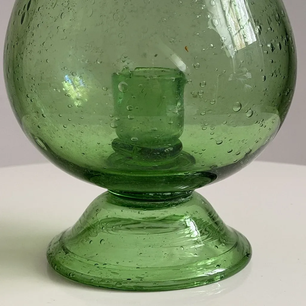 Green blown glass photophore from the Biot glassworks, height 22 cm.