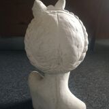 Bust girl in patinated terracotta