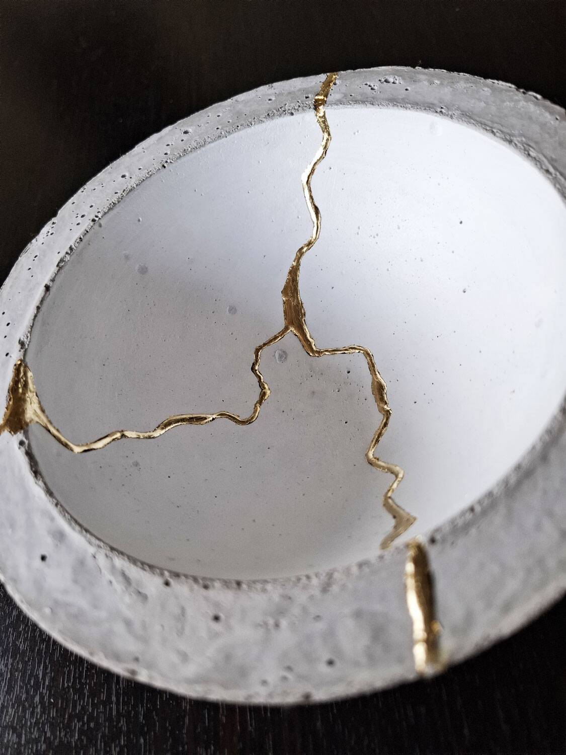 Kintsugi-inspired concrete and gold leaf cup