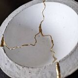 Kintsugi-inspired concrete and gold leaf cup
