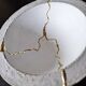 Kintsugi-inspired concrete and gold leaf cup