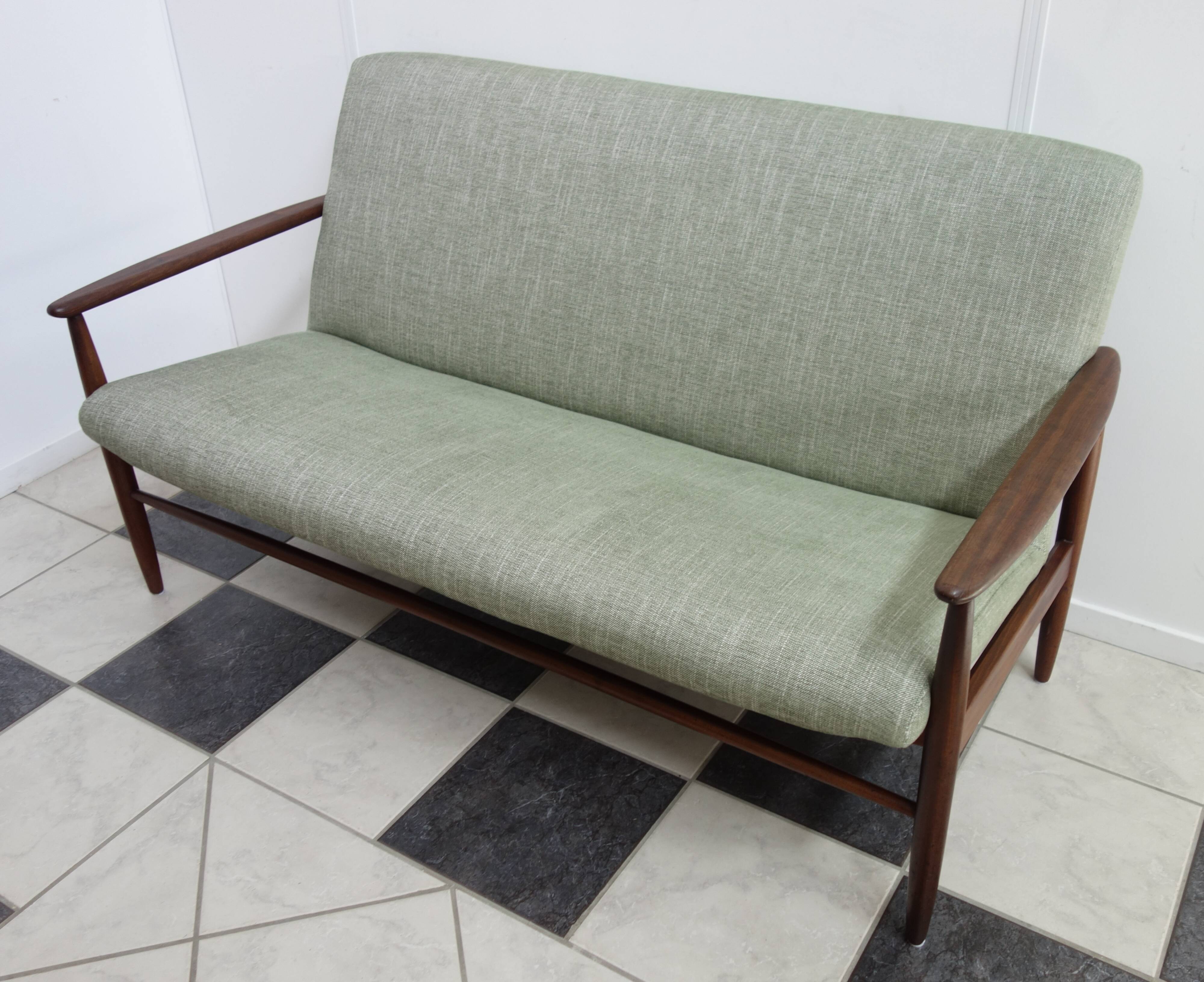 Danish teak 2 seat sofa green upholstery
