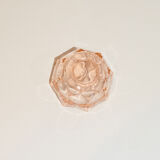 Empty pink glass jar pocket