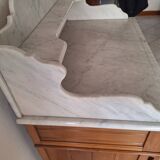 Old bathroom cabinet with marble