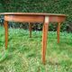 Directoire style round table with extensions