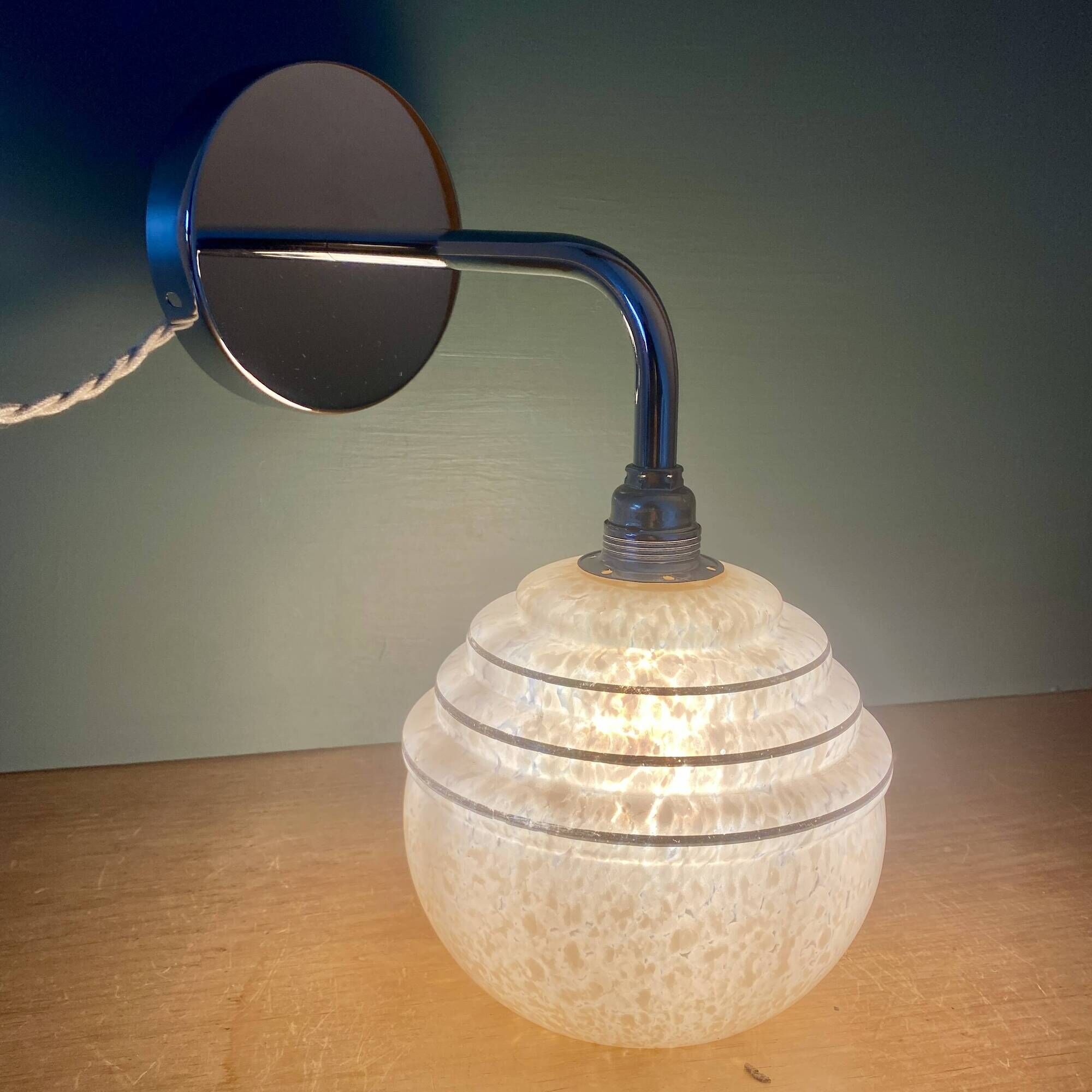 Vintage golden globe elbow wall light in pink and silver Clichy glass