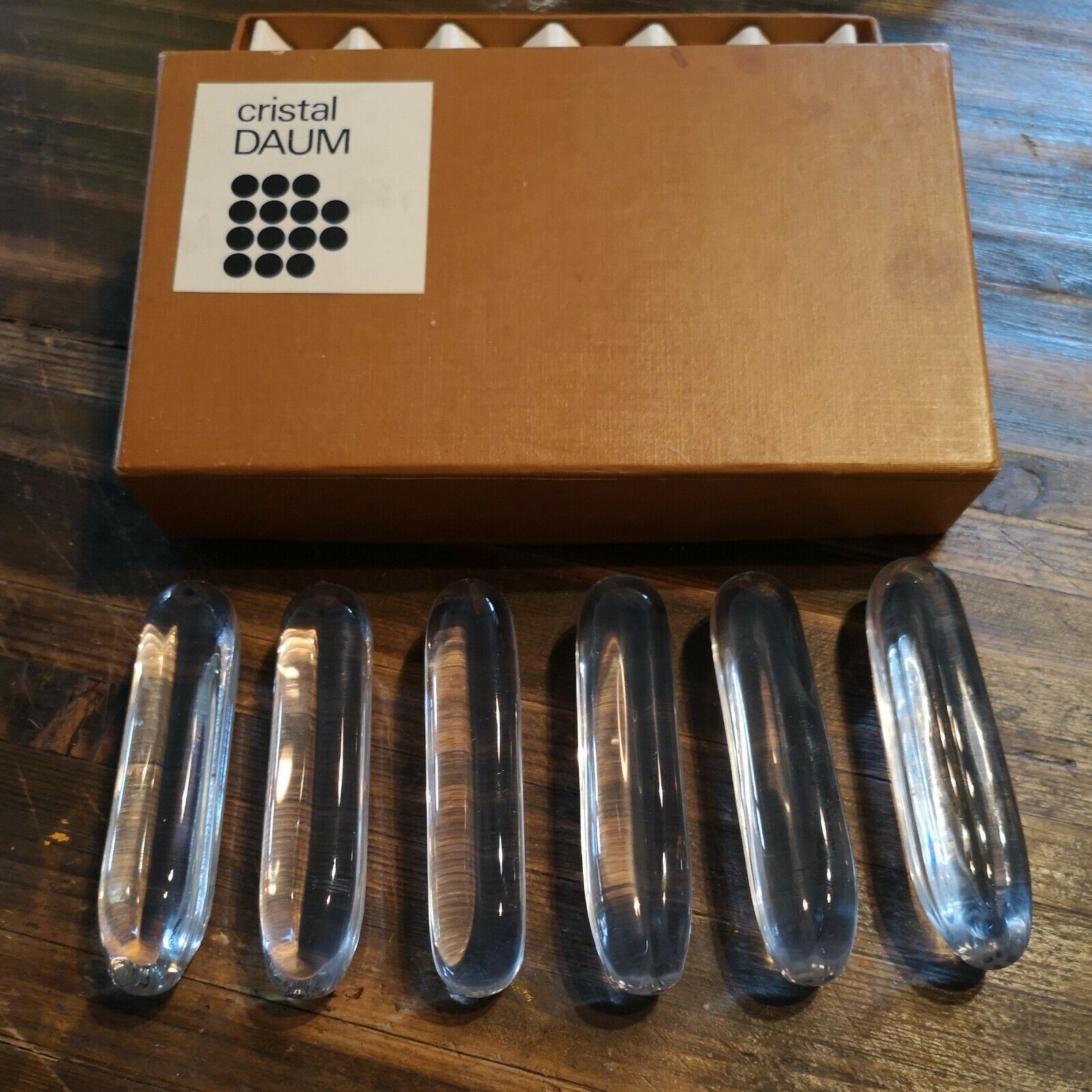 Series of 6 knife holders signed Daum France in box