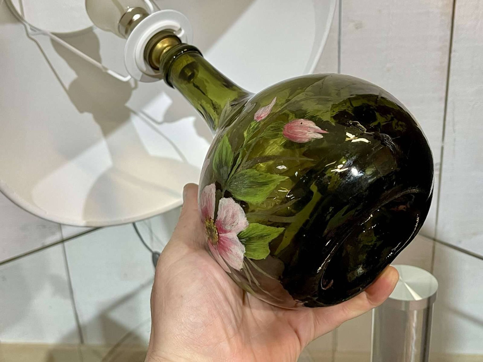 Blown glass lamp painted with a floral design, early 20th century.