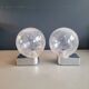 Pair of vintage wall lights in chrome metal with bubbled glass globes.