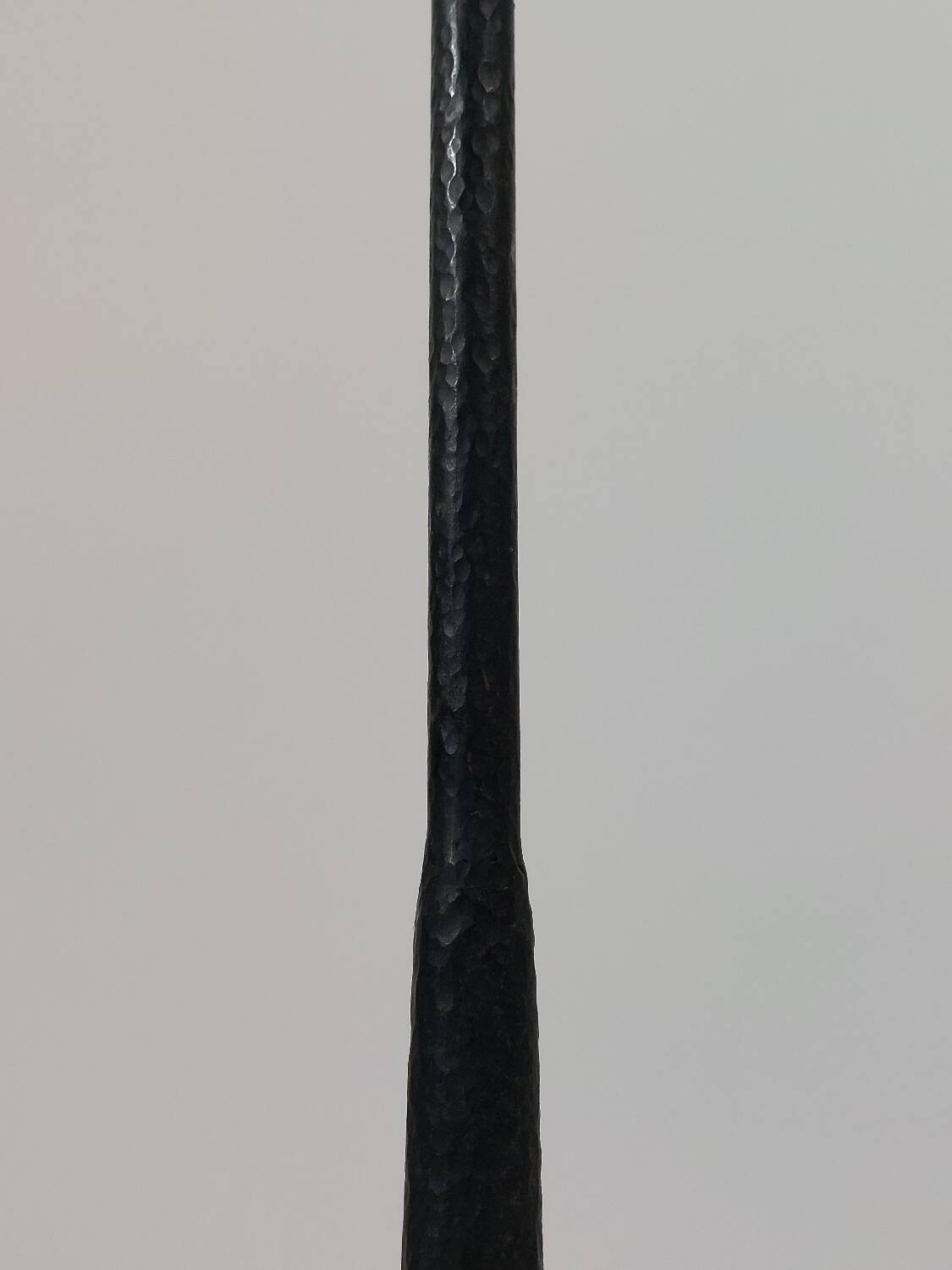 A pair of beautiful and exquisite vintage wrought iron candlesticks from the mid-century.